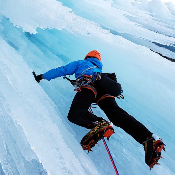 Extreme sports insurance extreme sports equipment insurance extreme sports injury insurance an ice climber with extreme sports injury insurance climbing up an extreme ice-fall is glad that he has the cover in case he falls off
